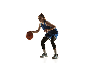 Image showing Young caucasian female basketball player against white studio background