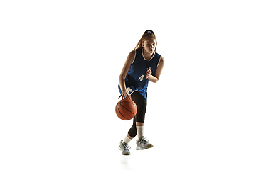 Image showing Young caucasian female basketball player against white studio background