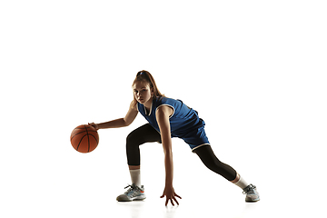 Image showing Young caucasian female basketball player against white studio background