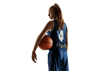 Image showing Young caucasian female basketball player against white studio background