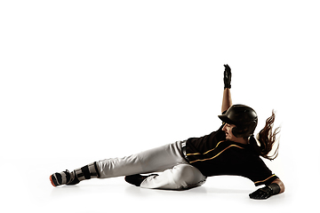 Image showing Baseball player, pitcher in a black uniform practicing on a white background.