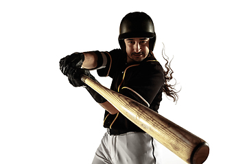 Image showing Baseball player, pitcher in a black uniform practicing on a white background.