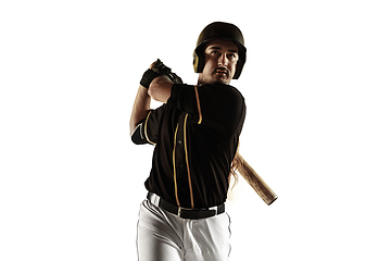 Image showing Baseball player, pitcher in a black uniform practicing on a white background.