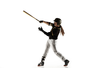 Image showing Baseball player, pitcher in a black uniform practicing on a white background.