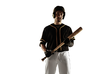 Image showing Baseball player, pitcher in a black uniform practicing on a white background.