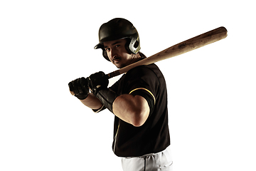 Image showing Baseball player, pitcher in a black uniform practicing on a white background.