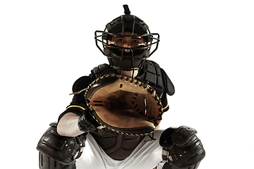 Image showing Baseball player, pitcher in a black uniform practicing on a white background.