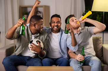 Image showing friends or soccer fans with ball and beer at home