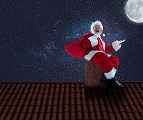 Image showing Emotional Santa Claus congratulating with New Year and Christmas