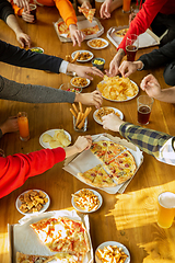 Image showing Happy co-workers celebrating while company party and corporate event