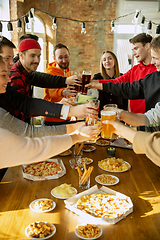 Image showing Happy co-workers celebrating while company party and corporate event