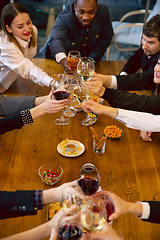 Image showing Happy co-workers celebrating while company party and corporate event