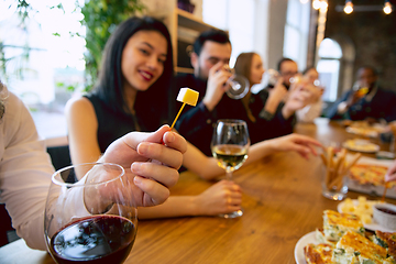 Image showing Happy co-workers celebrating while company party and corporate event