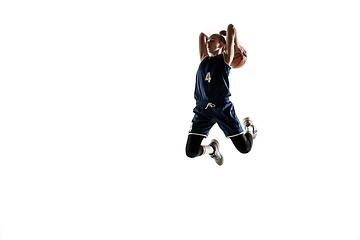 Image showing Young caucasian female basketball player against white studio background