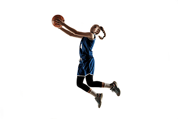 Image showing Young caucasian female basketball player against white studio background