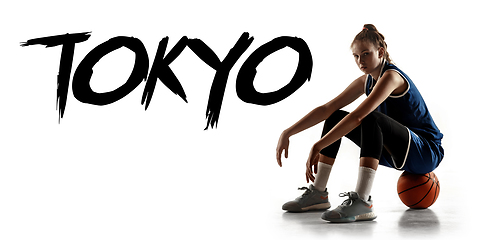 Image showing Young caucasian female basketball player on white studio background, Tokyo