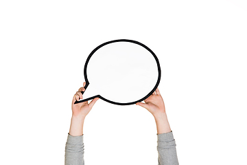 Image showing Hands holding the sign of comment on white studio background