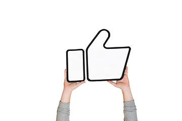 Image showing Hands holding the sign of like on white studio background