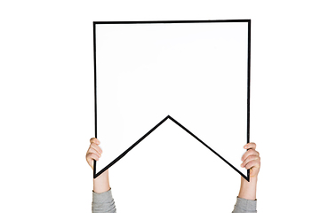 Image showing Hands holding the sign of bookmark on white studio background