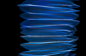 Image showing Bright neon line designed background, shot with long exposure, blue