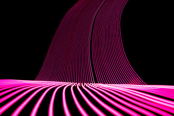 Image showing Bright neon line designed background, shot with long exposure, pink