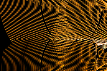 Image showing Bright neon line designed background, shot with long exposure, yellow gold