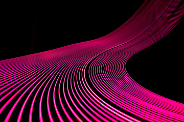 Image showing Bright neon line designed background, shot with long exposure, pink