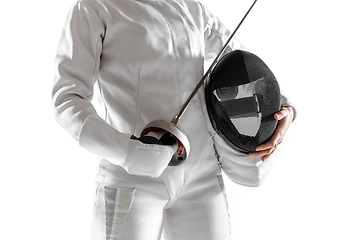 Image showing Teen girl in fencing costume with sword in hand isolated on white background