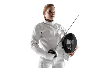 Image showing Teen girl in fencing costume with sword in hand isolated on white background