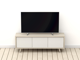 Image showing Wood tv cabinet and tv with blank screen