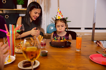 Image showing Mother and daughter celebrating a birthday at home
