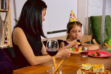 Image showing Mother and daughter celebrating a birthday at home