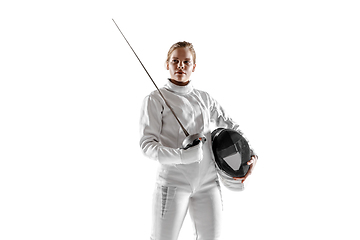 Image showing Teen girl in fencing costume with sword in hand isolated on white background