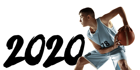 Image showing Full length portrait of a young basketball player with ball, meeting 2020