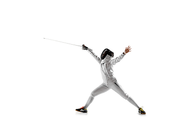 Image showing Teen girl in fencing costume with sword in hand isolated on white background