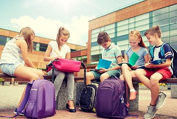 Image showing group of happy elementary school students outdoors