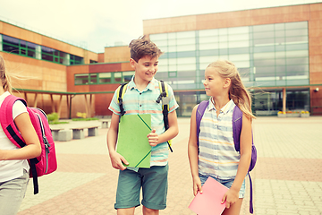 Image showing group of happy elementary school students walking