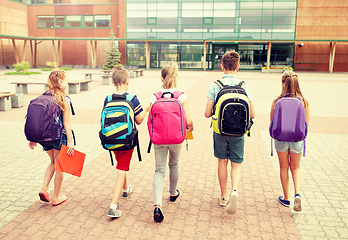 Image showing group of happy elementary school students walking