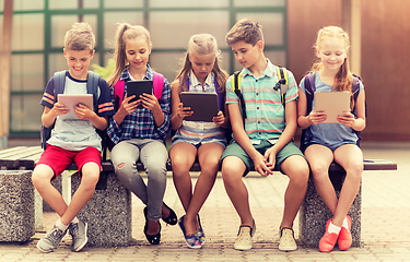 Image showing group of happy elementary school students talking