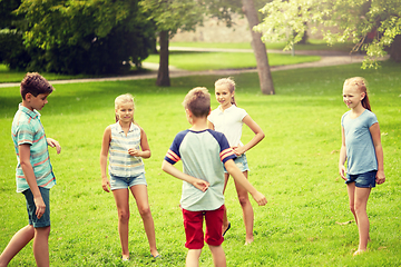 Image showing happy kids playing game in summer park