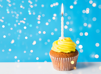 Image showing birthday cupcake with one burning candle