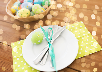 Image showing close up of table setting and easter eggs