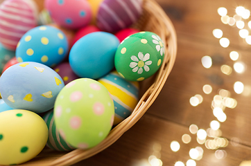 Image showing close up of colored easter eggs in basket