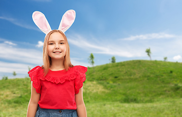 Image showing happy girl wearing easter bunny ears headband