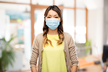 Image showing asian young woman in protective medical mask