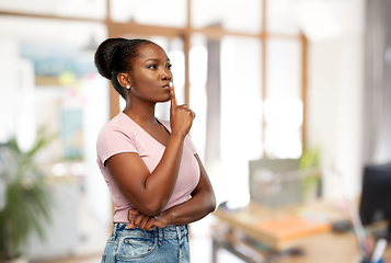 Image showing african american woman with finger on lips