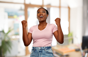 Image showing happy african american woman celebrating success