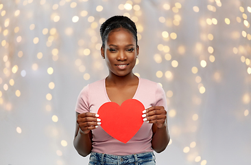 Image showing happy african american woman with red heart