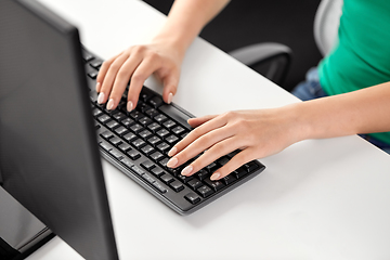 Image showing female hands typing on computer keyboard