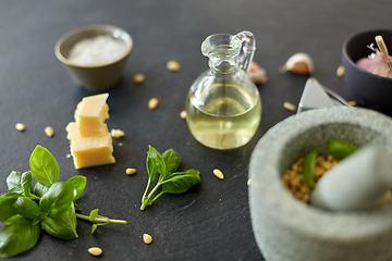 Image showing ingredients for basil pesto sauce on stone table